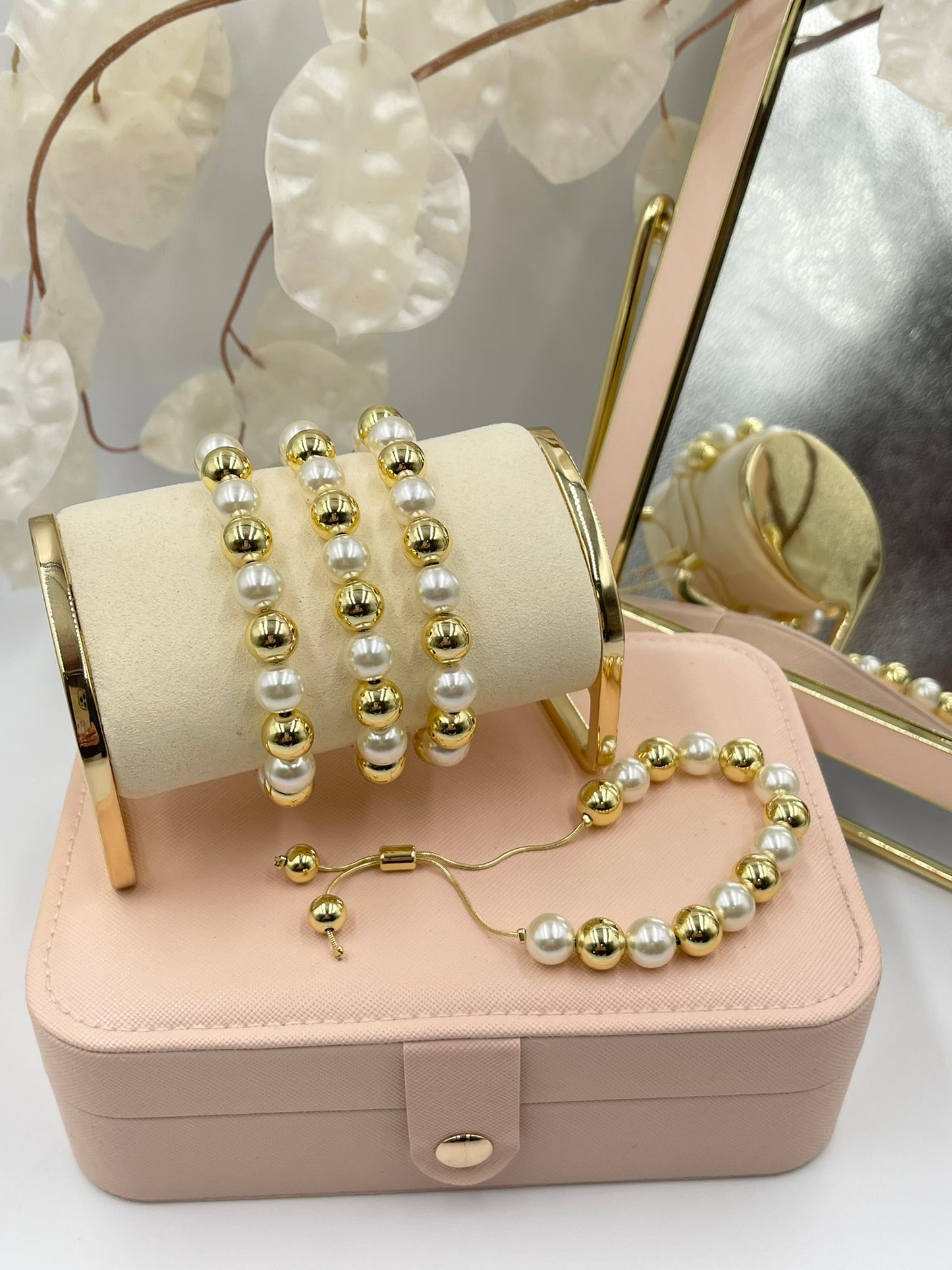 Gold and Pearl Bracelets