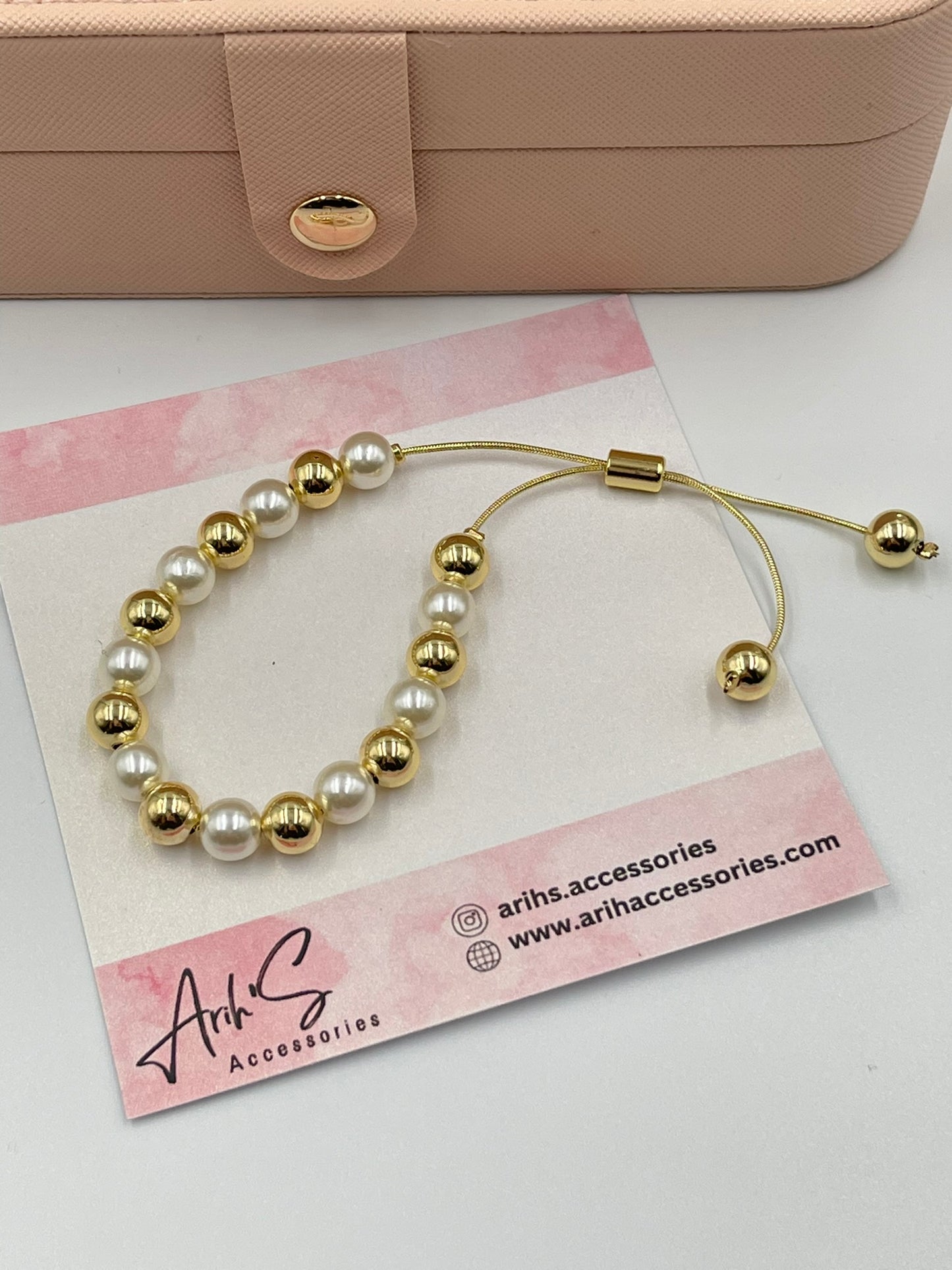 Gold and Pearl Bracelets