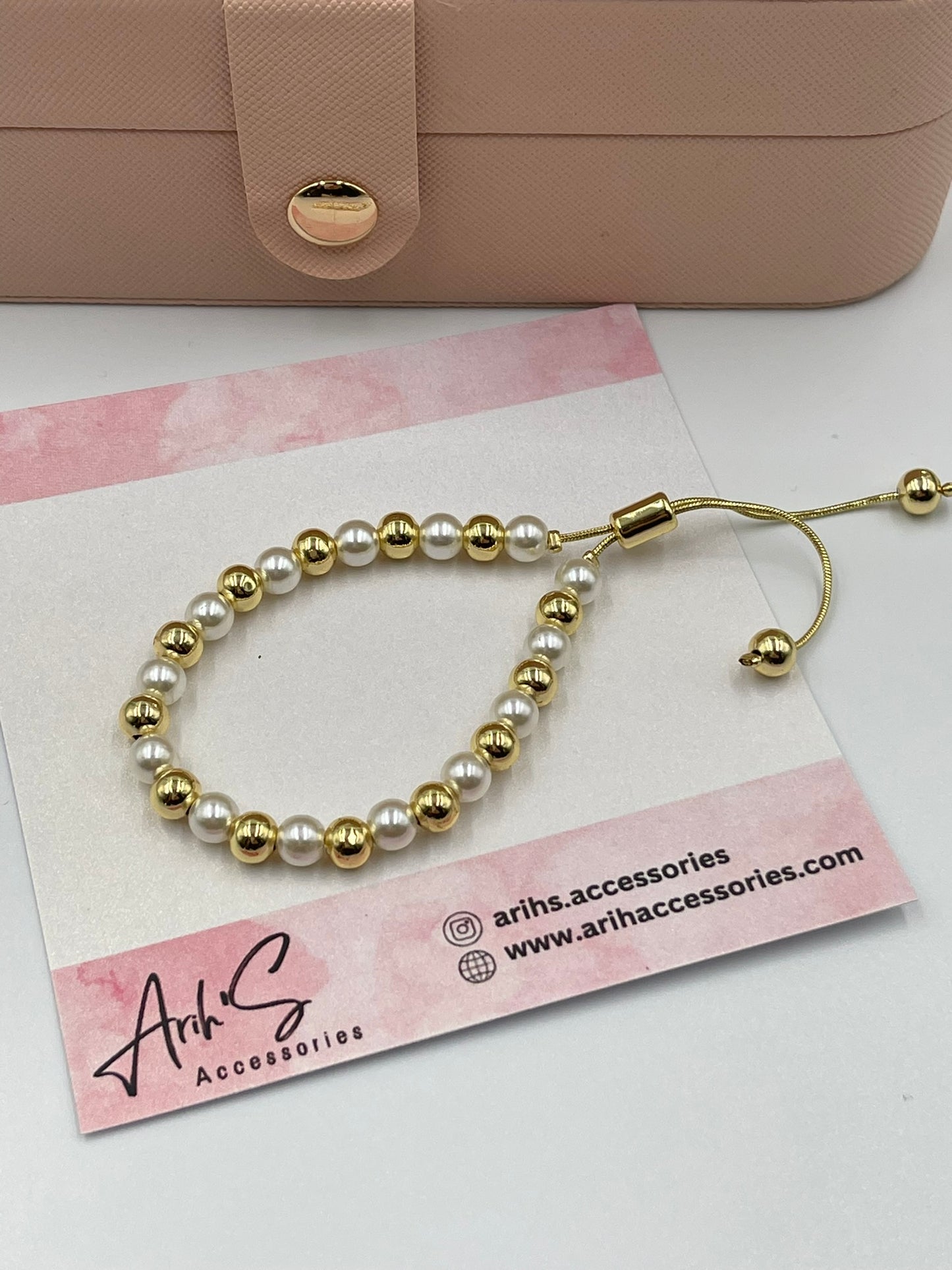 Gold and Pearl Bracelets