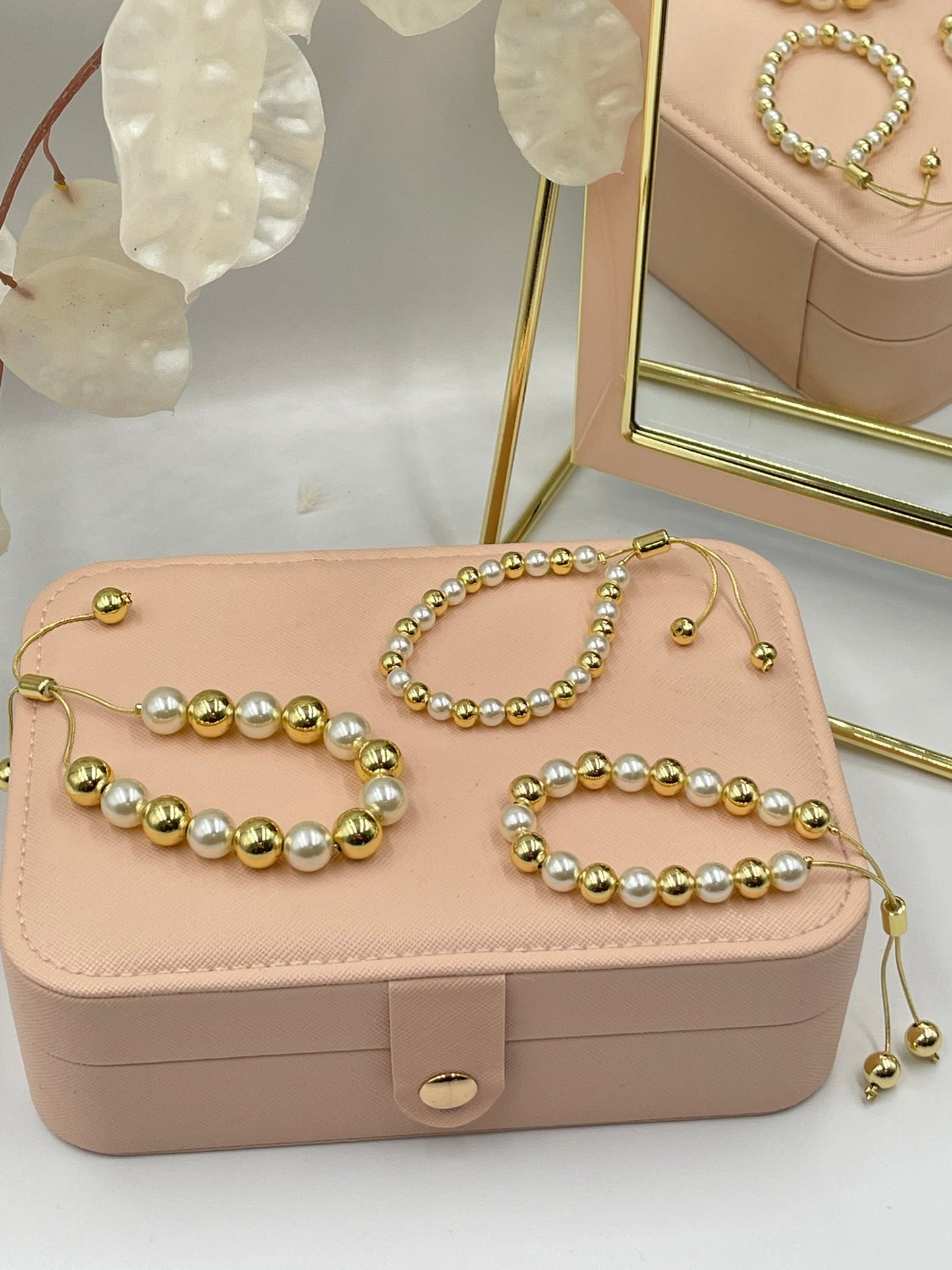 Gold and Pearl Bracelets