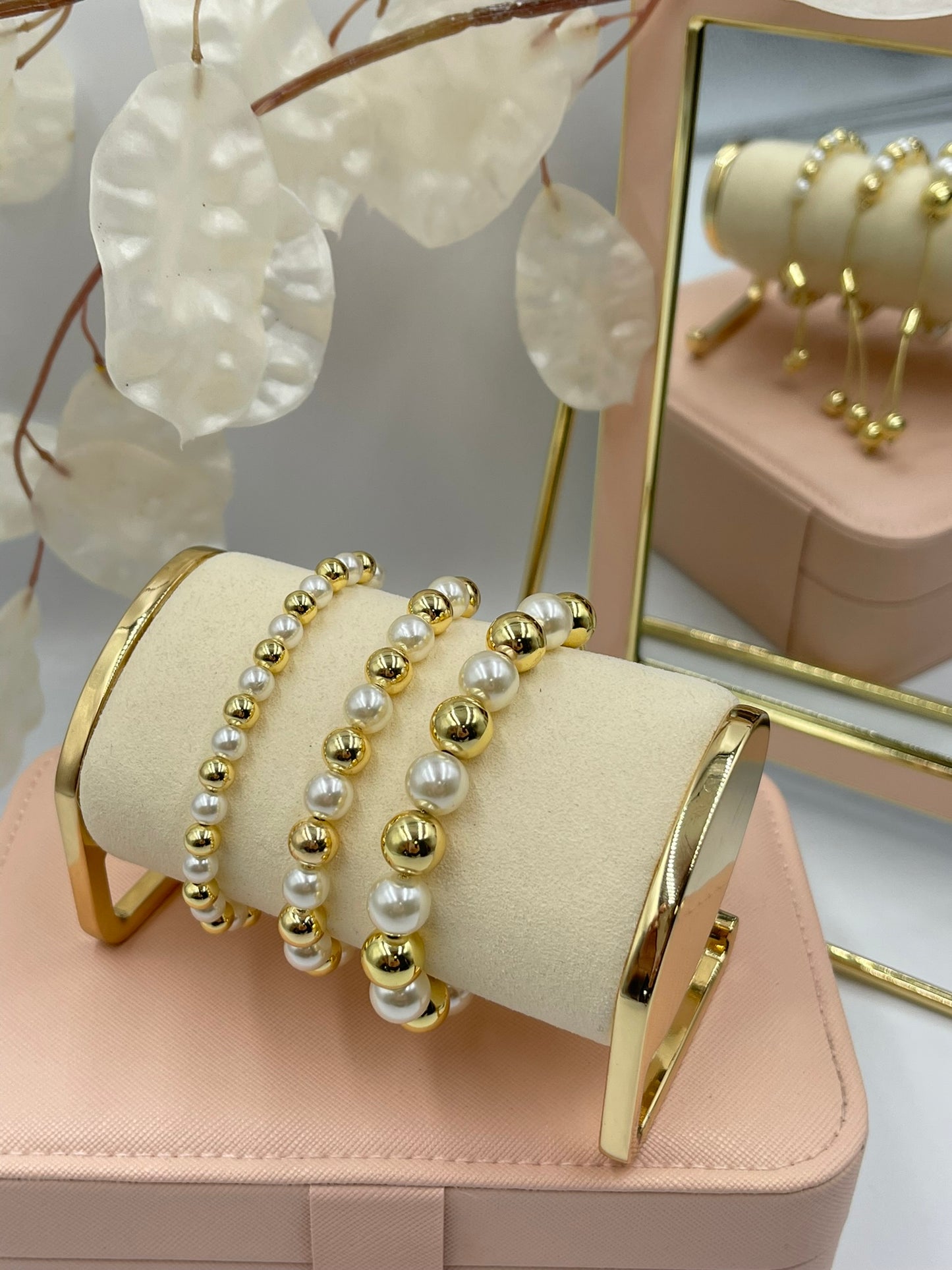 Gold and Pearl Bracelets